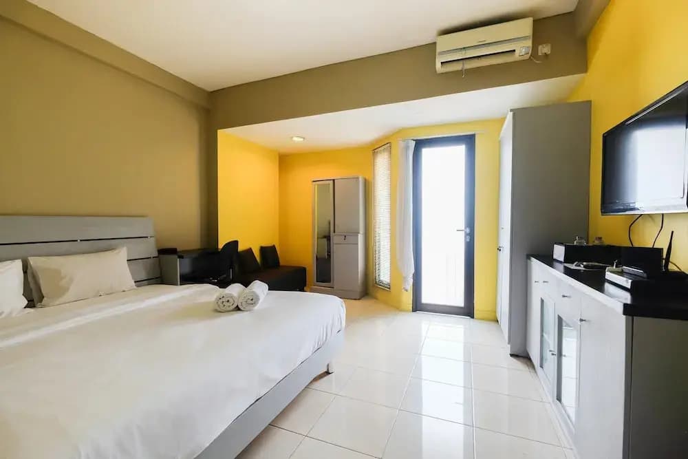 Modern and Comfy Studio Tamansari Sudirman Apartment - photo 2