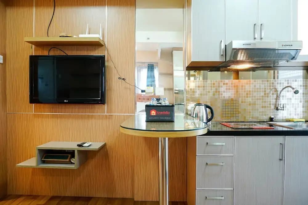 Furnished Studio with Comfortable Design Green Pramuka Apartment - photo 18