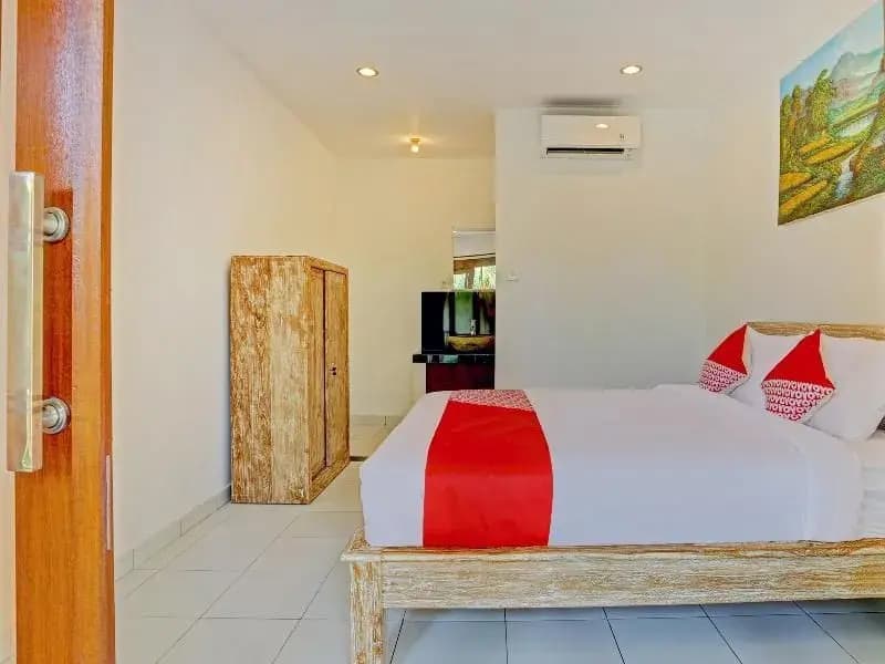 OYO 90337 Wiguna Homestay - photo 6