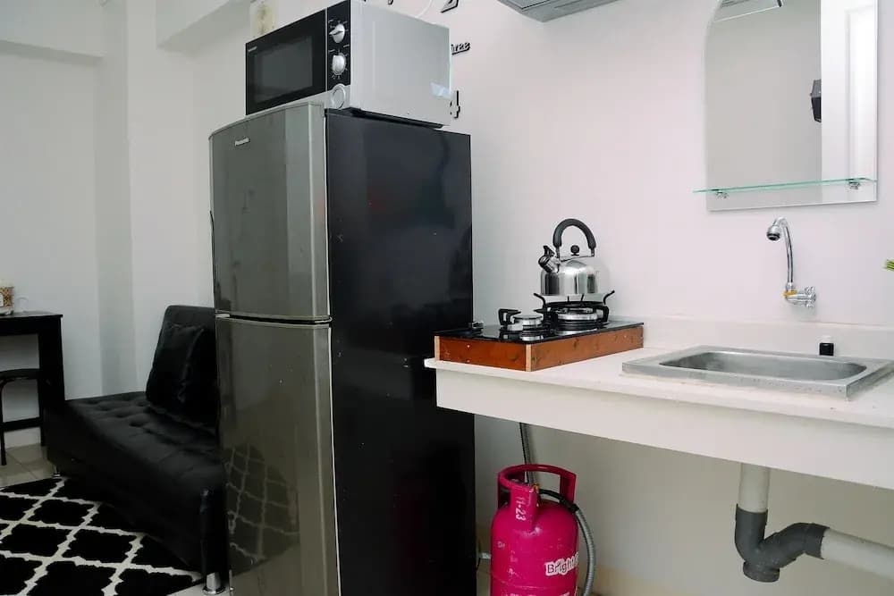 Homey 2BR at Bassura City Apartment - photo 13