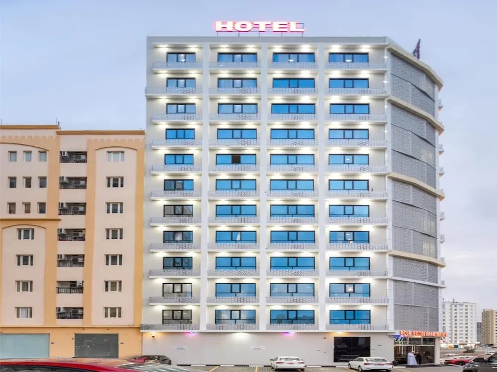 OYO Townhouse 156 Rose Hotel Apartments. - photo 1