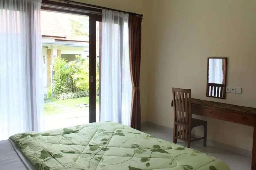 Purnama Guesthouse - photo 2