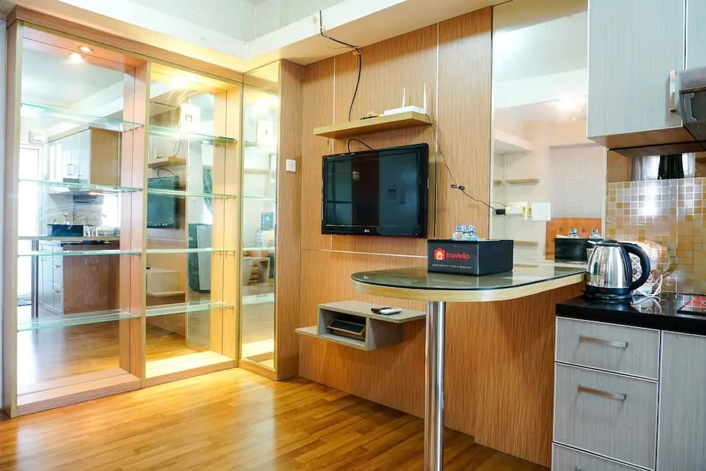 Furnished Studio with Comfortable Design Green Pramuka Apartment - photo 19