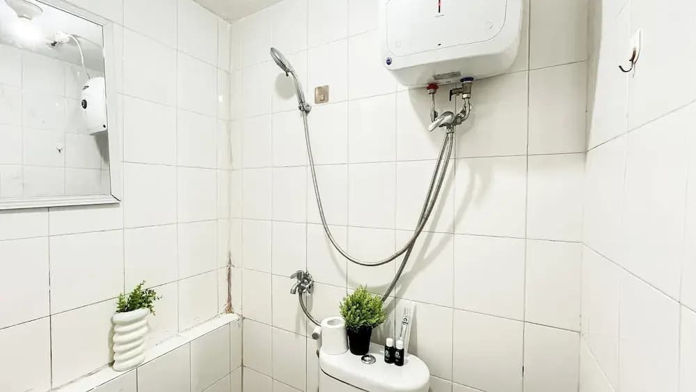 Warm And Comfy 2Br At Bassura City Apartment - photo 10