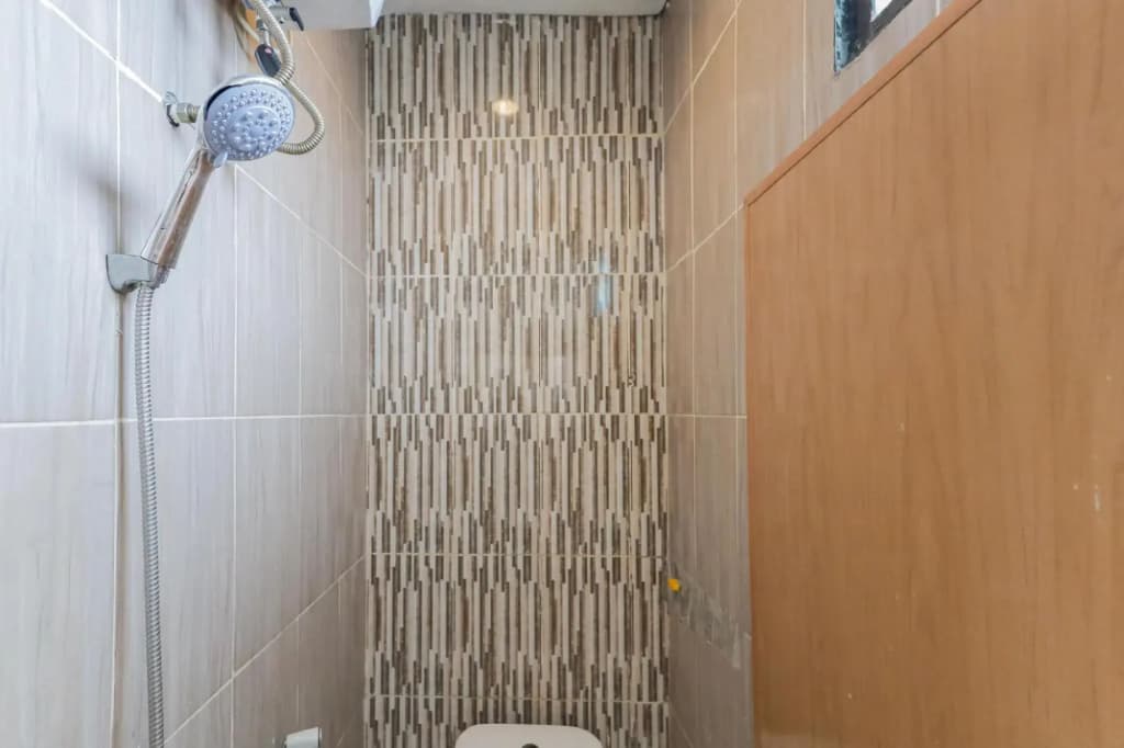 Wisma Basco Syariah by OYO Rooms - photo 9