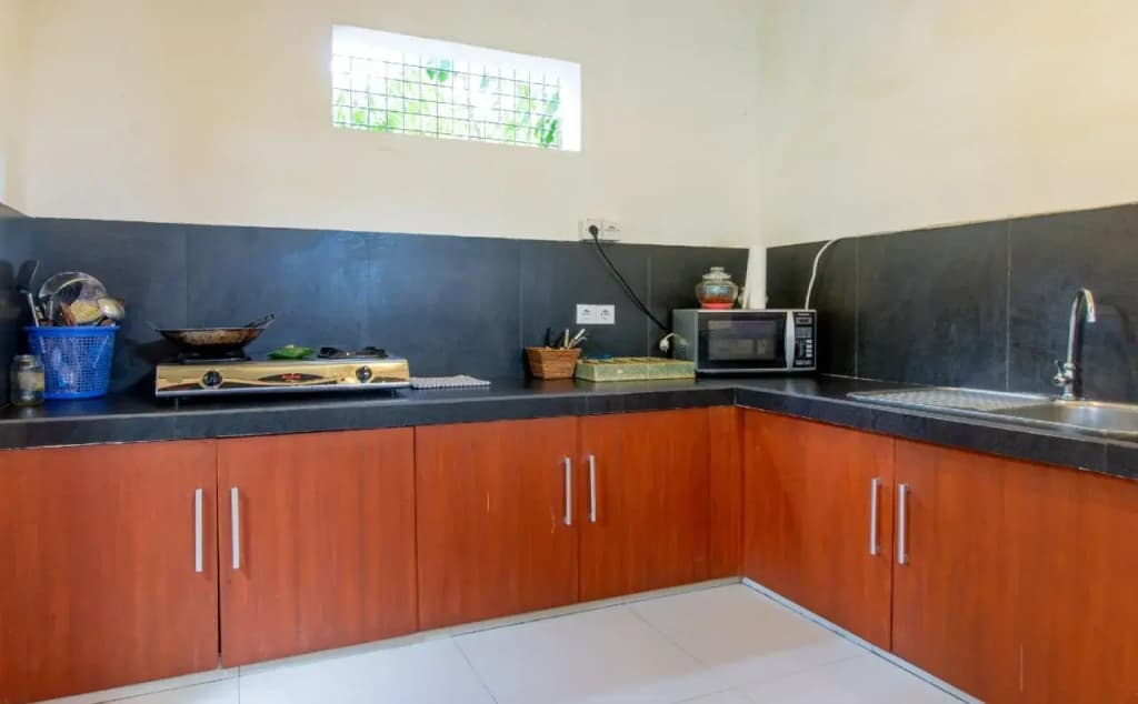 OYO 401 The Frog Homestay Sanur - photo 18