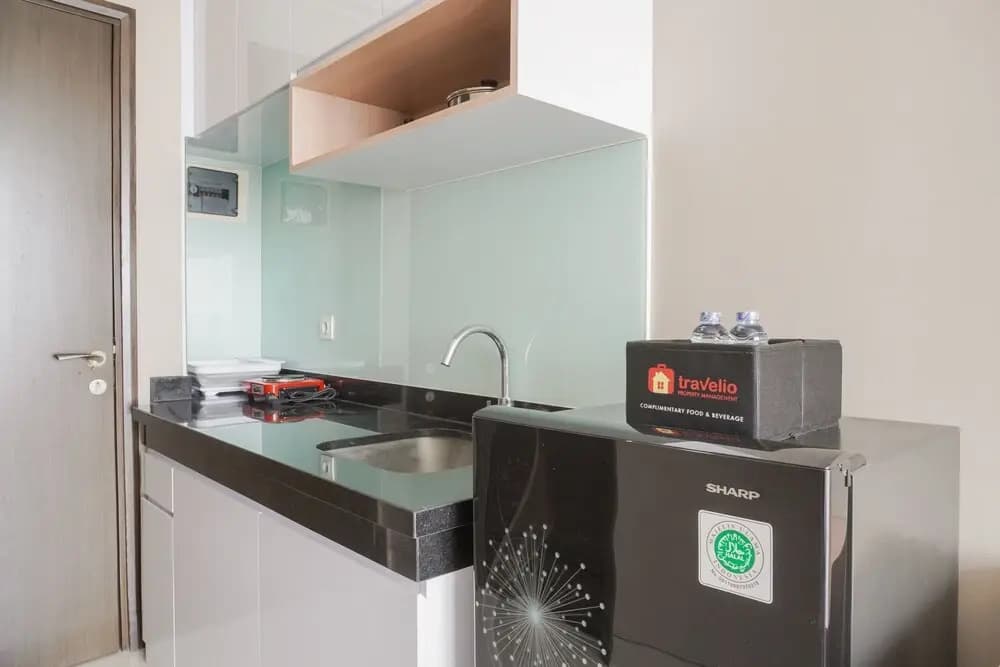 Minimalist and Comfort Studio at Ciputra International Apartment - photo 11