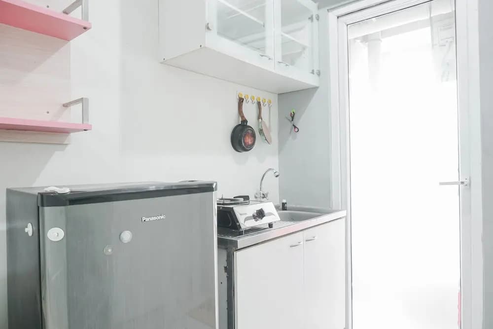 Nice And Cozy Living 2Br At Green Pramuka City Apartment - photo 4