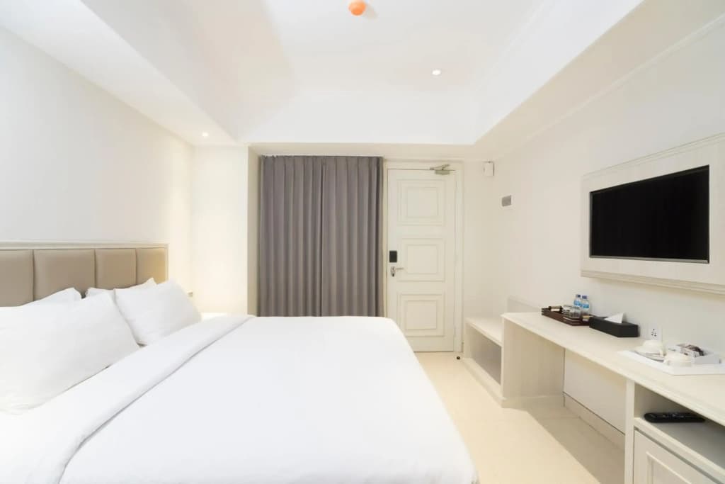 Alron Hotel Kuta Powered by Archipelago - photo 4