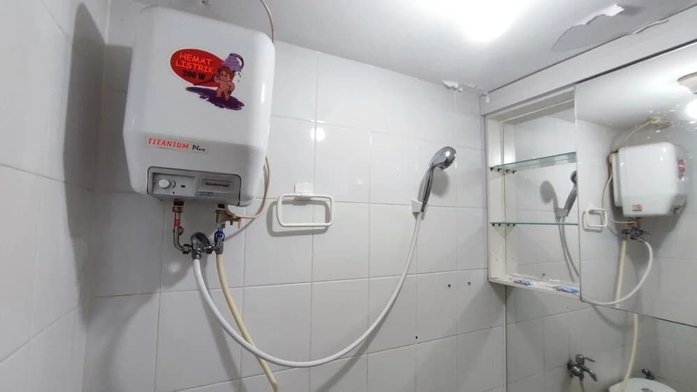TRV at Bassura Apartment by Ruang Nyaman - photo 7