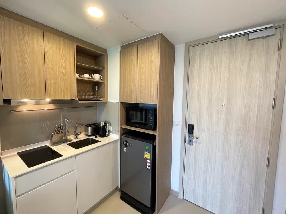Apartment at Sky Park Condo by Lofty - photo 16