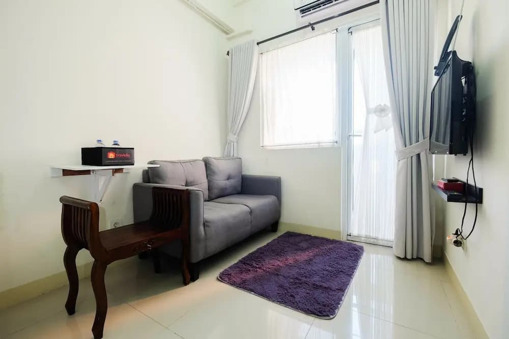 Tranquil 2BR @ Green Pramuka Apartment - photo 12