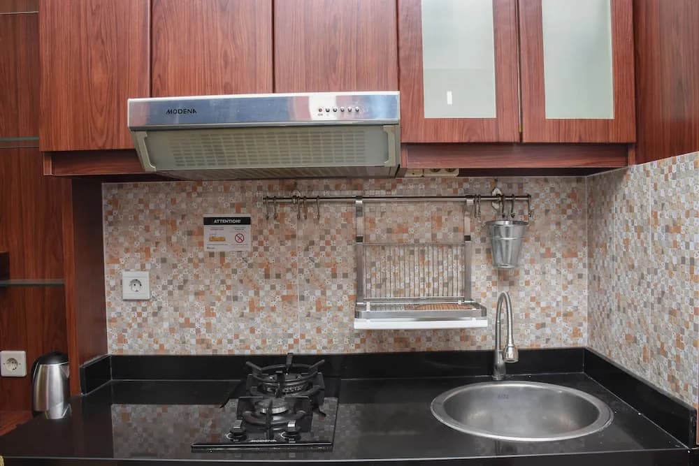 Great Location And Comfy 1Br Apartment At Woodland Park Residence - photo 12