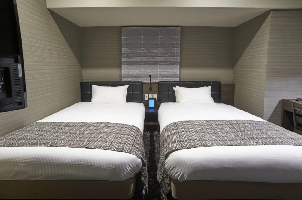 Quintessa Hotel Tokyo Haneda Comic & Books - photo 7
