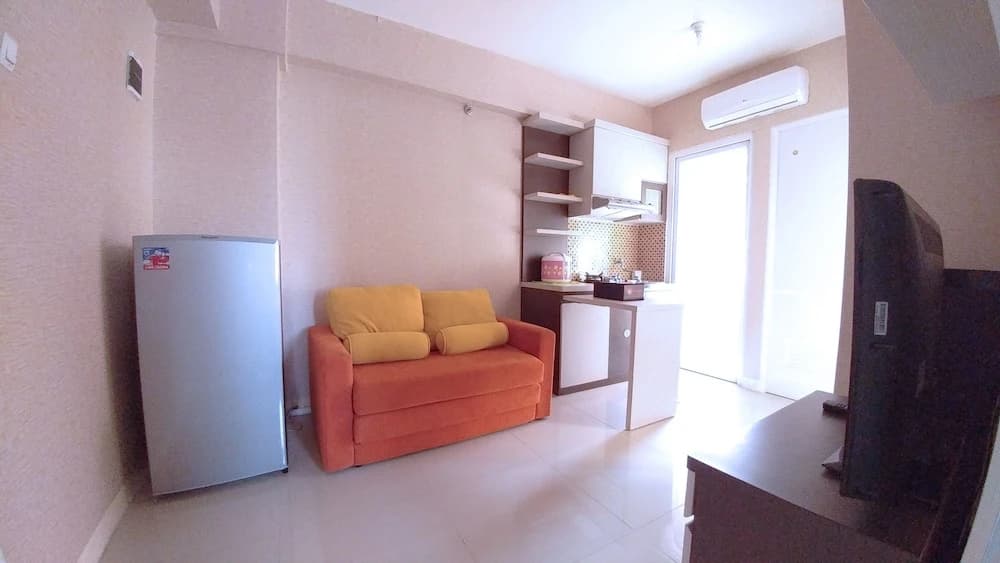 Good 2BR Apartment At Green Pramuka City By Travelio - photo 1