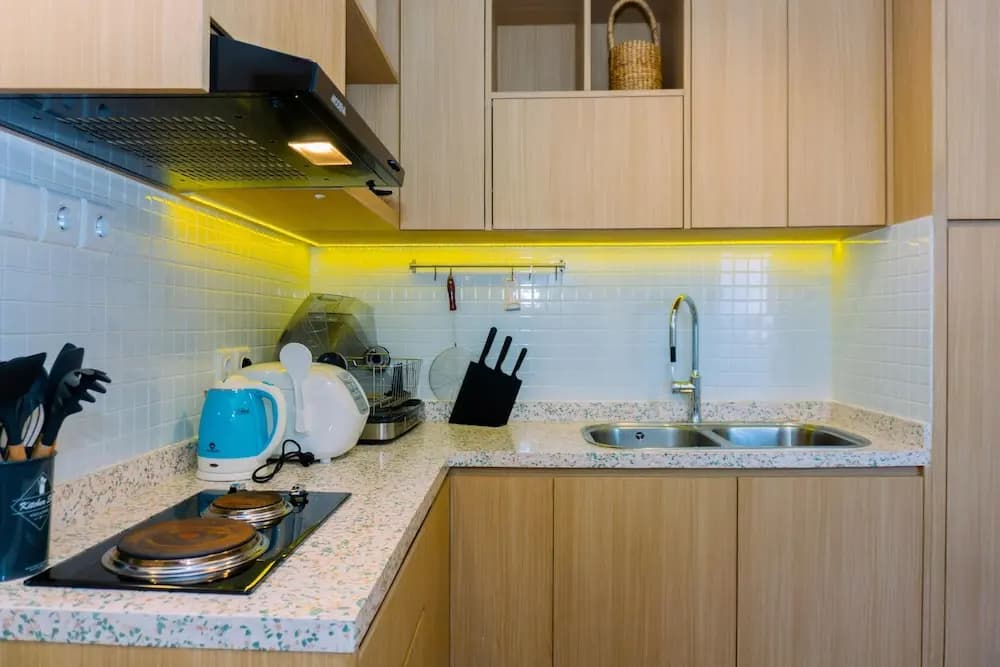 Spacious 1BR with Japandi Design at West Vista Apartment By Travelio - photo 13