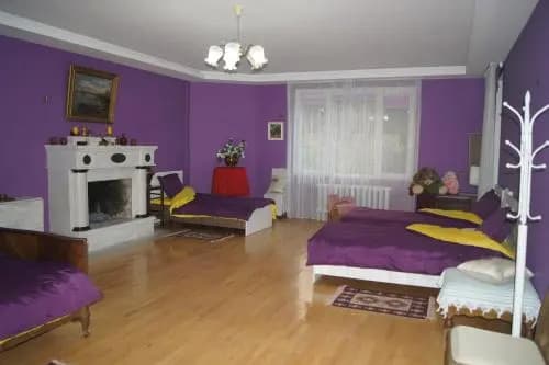 peaceful yellow hostel with garden - photo 2
