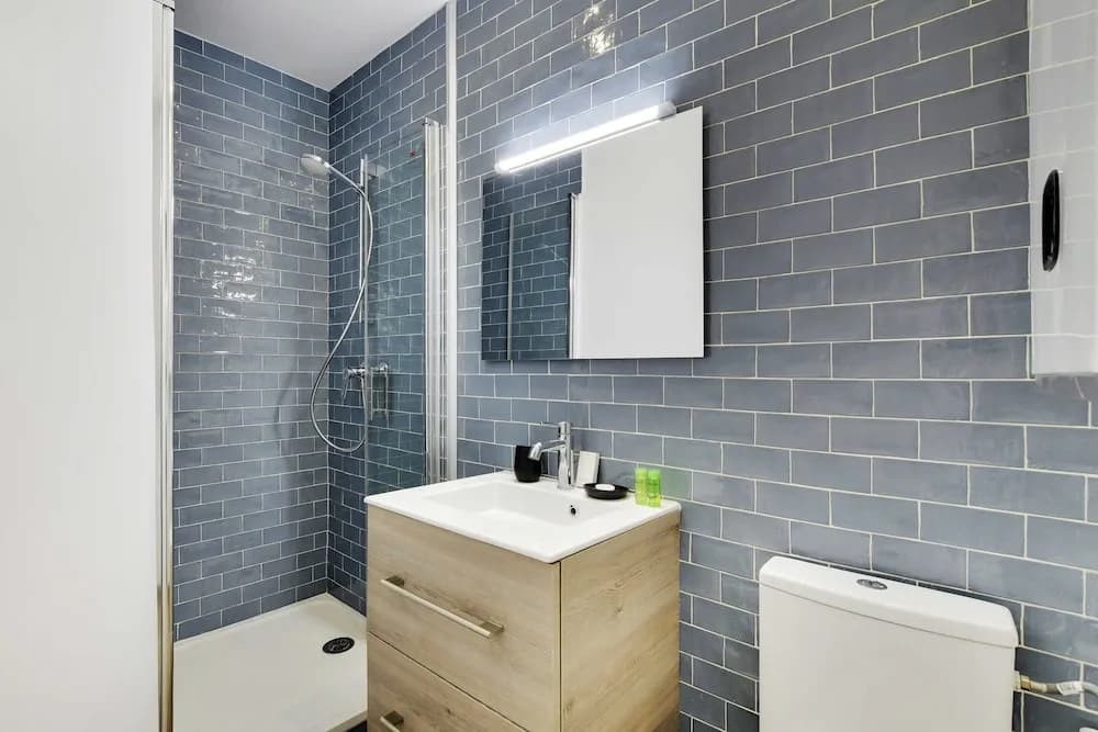 Charming 1-bedroom Apartment in Vibrant 19th Arrondissement - photo 11