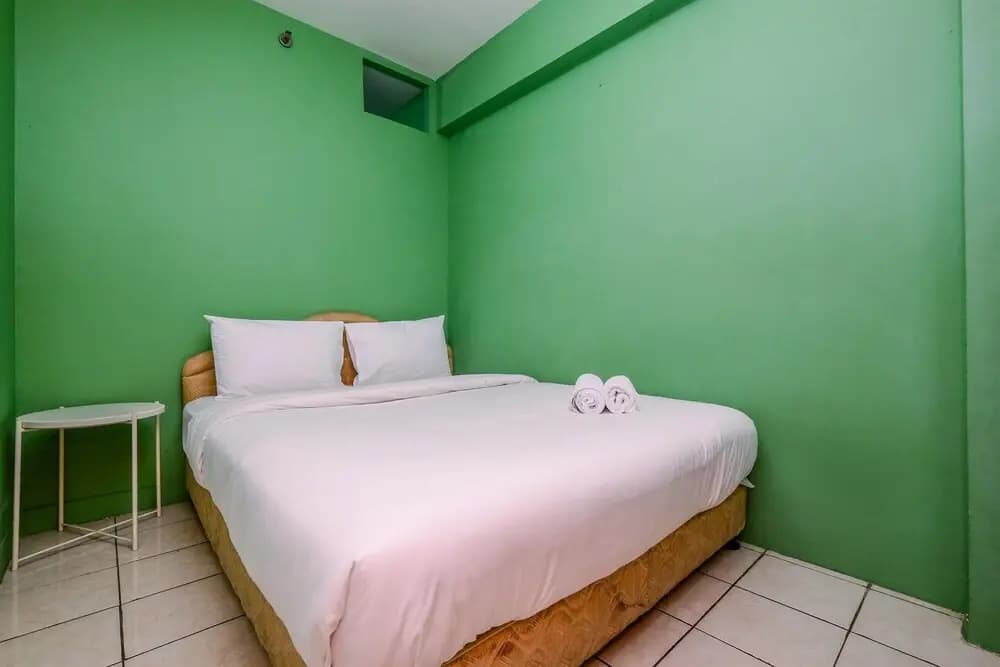 Minimalist And Cozy Style 2Br At Green Pramuka City Apartment - photo 2