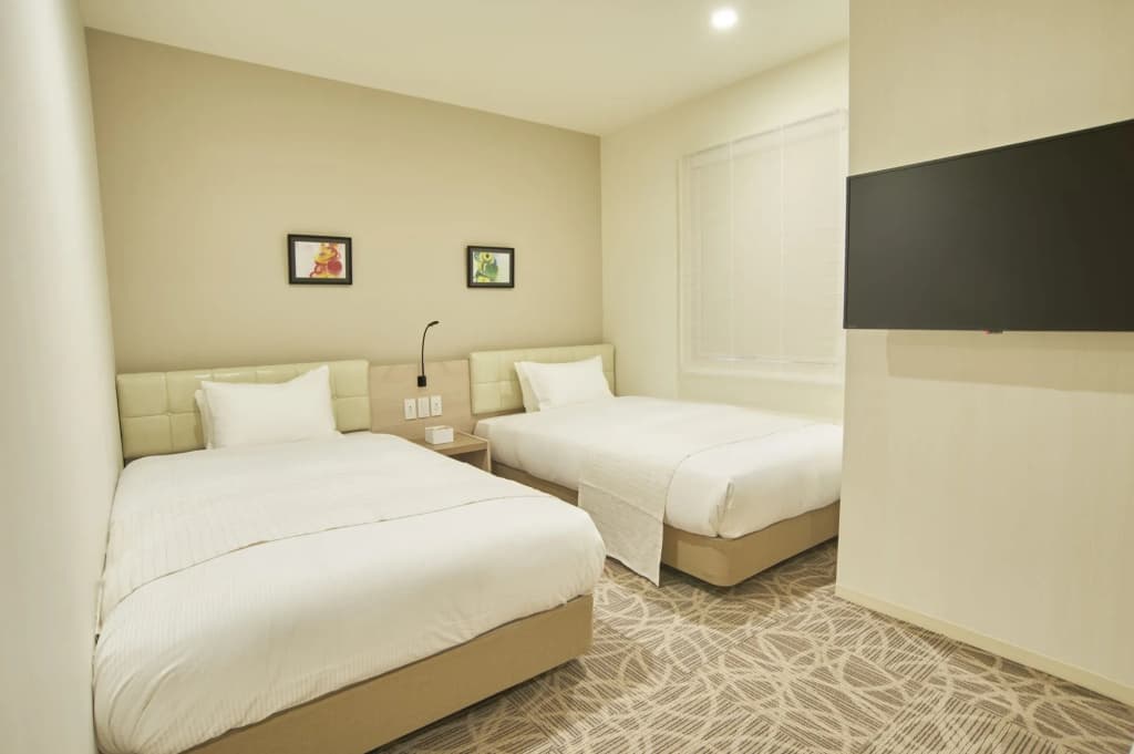 Quintessa Hotel Tokyo Haneda Comic & Books - photo 12