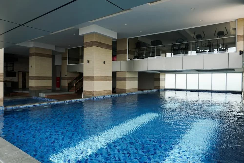 Modern 2BR Apartment at Maqna Residence - photo 9