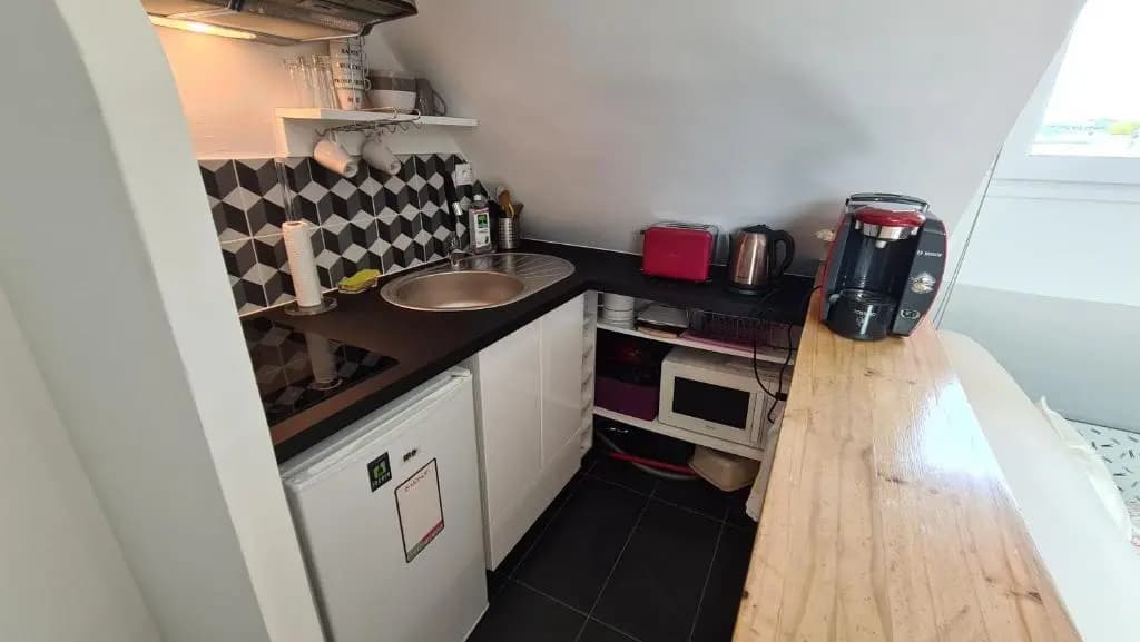 Appartement Cœur de Paris avec vue sur les toits - photo 6