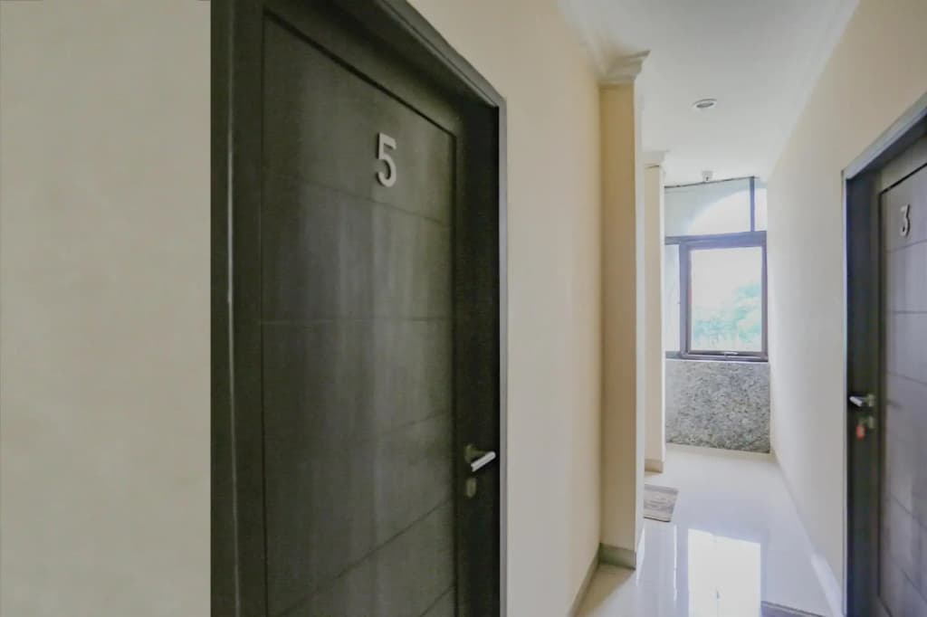 Wisma Basco Syariah by OYO Rooms - photo 40
