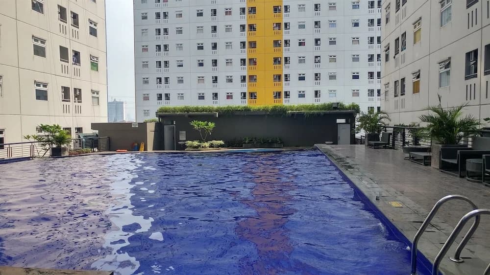 Furnished Green Pramuka City 2BR Apartment near Mall - photo 11