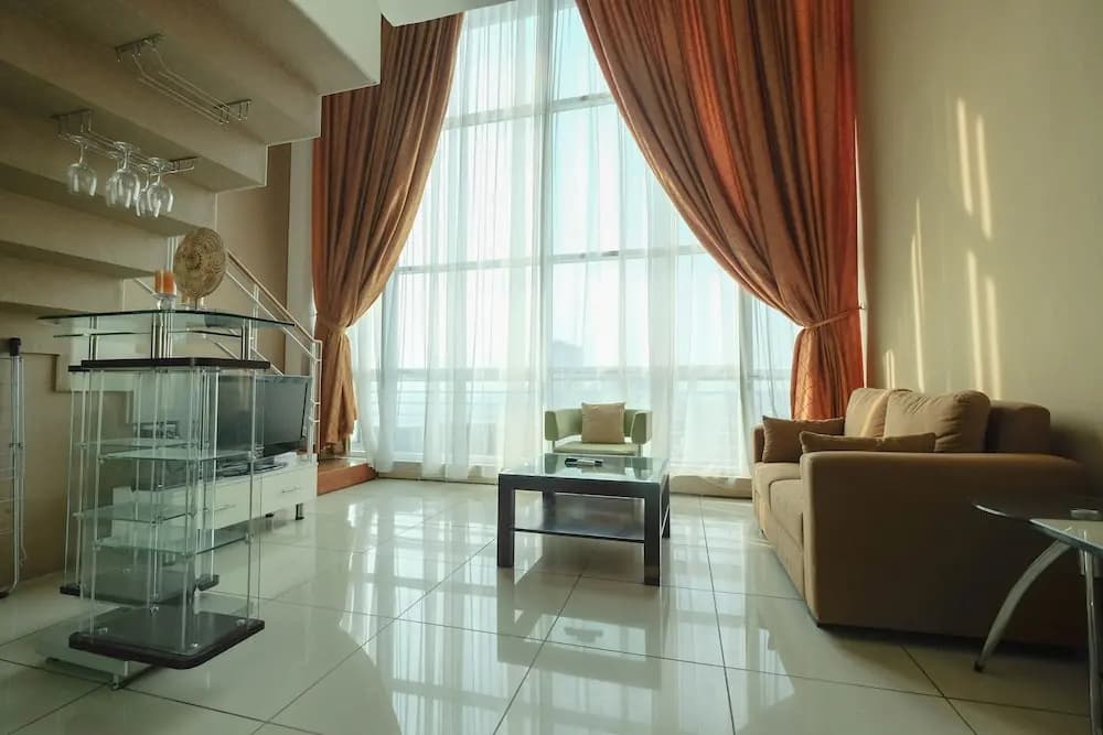 Spacious 1BR Two-Level Apartment at CityLofts Sudirman - main photo
