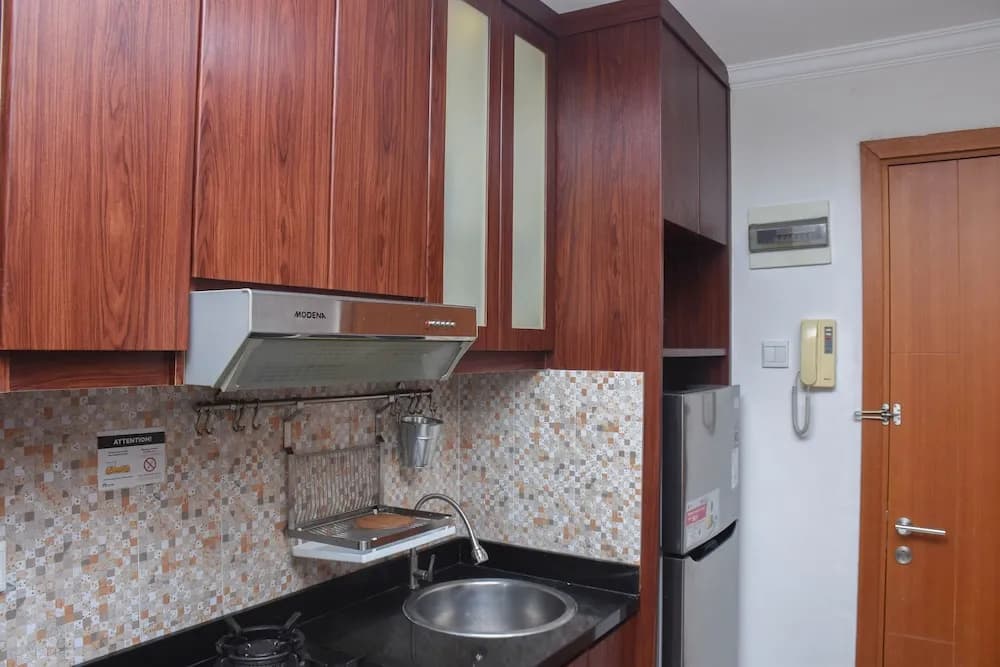 Great Location And Comfy 1Br Apartment At Woodland Park Residence - photo 13
