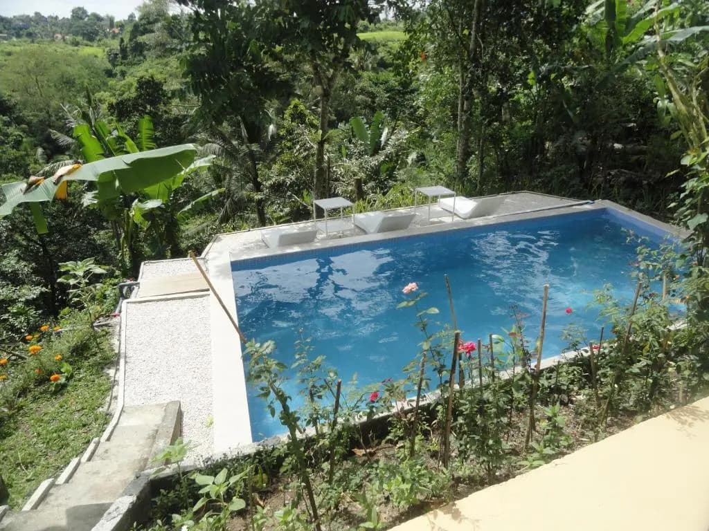 Putu Yoga Bungalow - photo 9