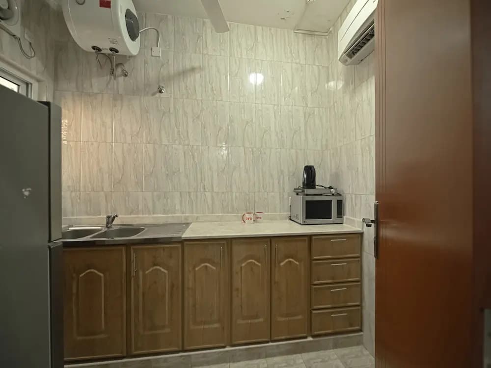 OYO 116 Platinium Hotel Apartments - photo 14