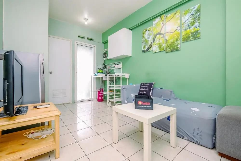 Minimalist And Cozy Style 2Br At Green Pramuka City Apartment - photo 1