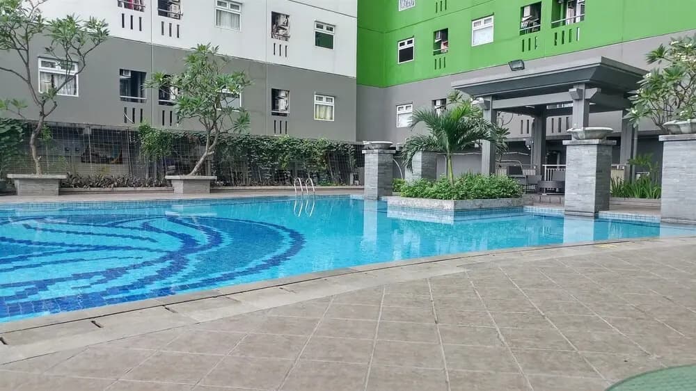 Minimalist And Cozy Style 2Br At Green Pramuka City Apartment - photo 11