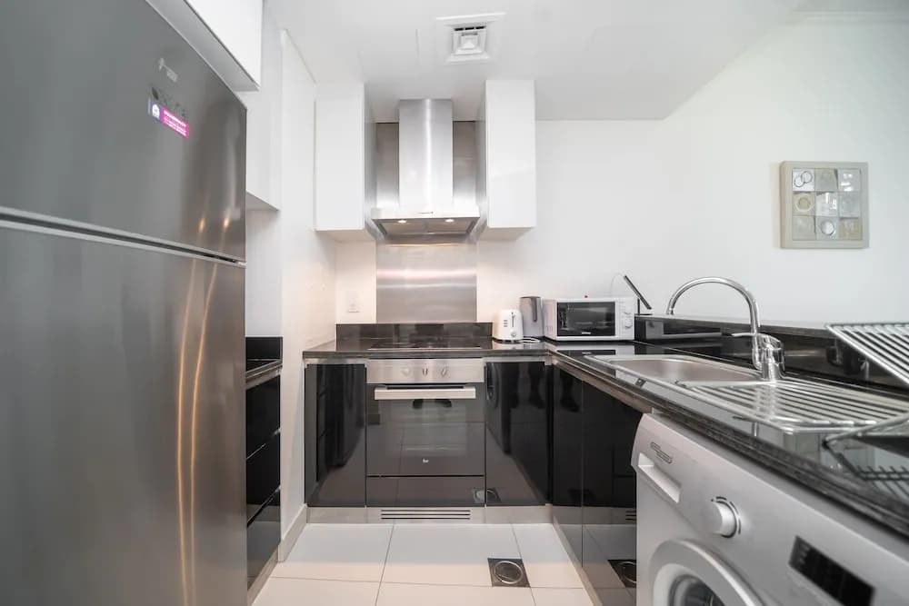 Exquisite 1BR Haven Partial Sea View - photo 13