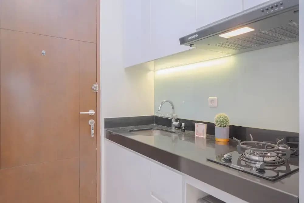 Modern Studio At Ciputra World 2 Apartment - photo 16