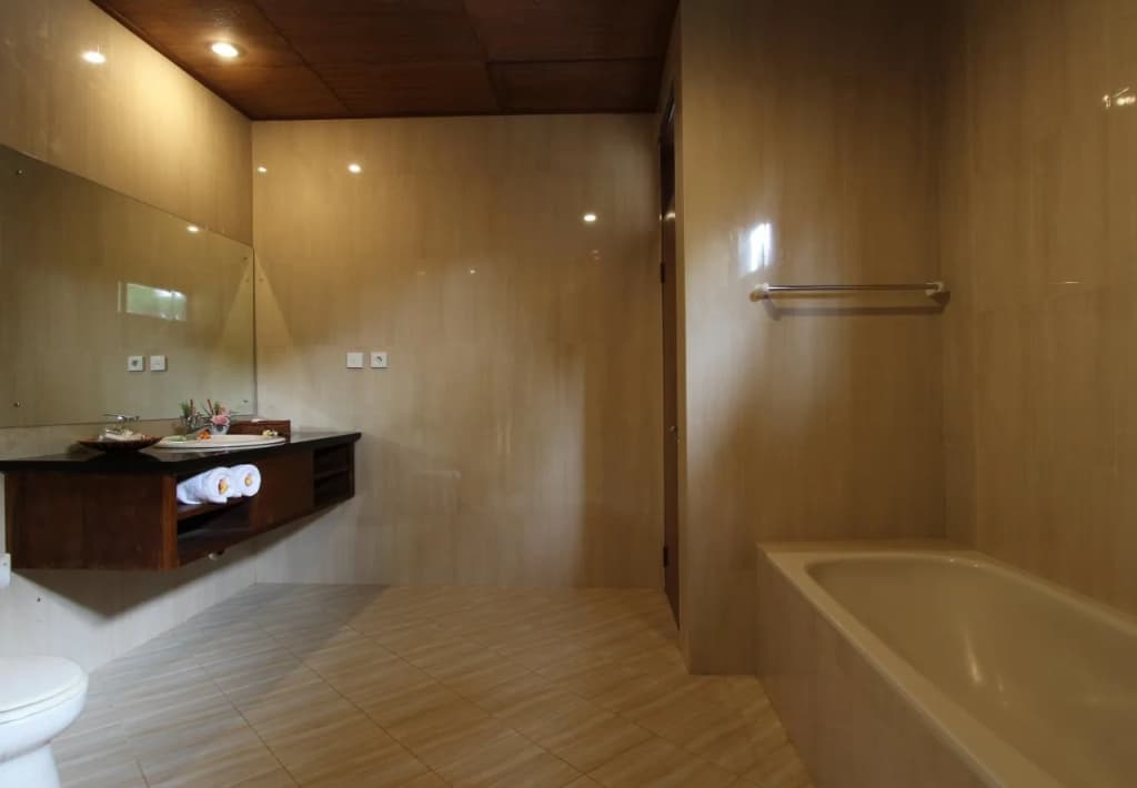 Putri Ayu Cottages - photo 9