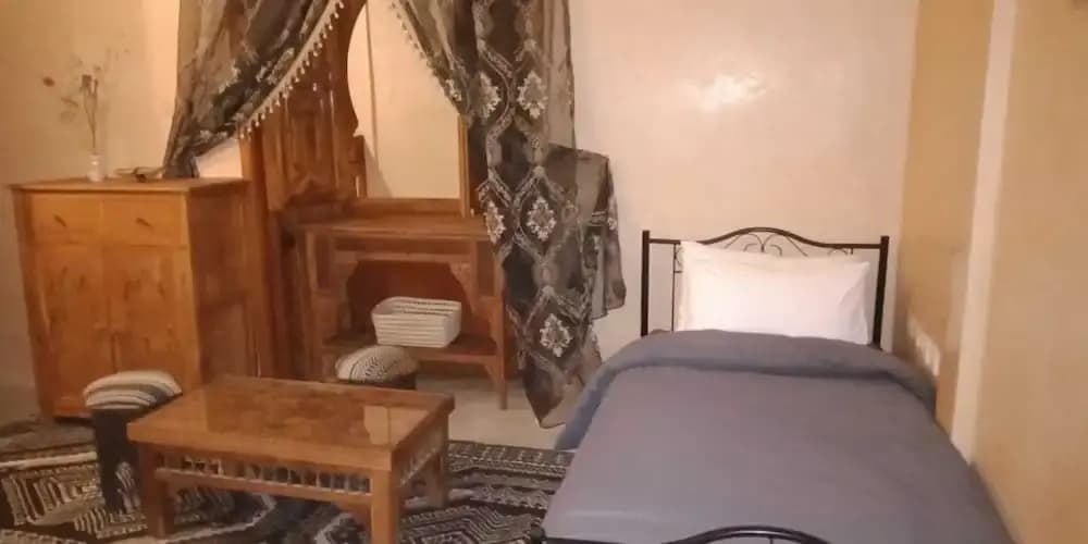 "room in Guest Room - Riad Lakouas Triple Room With Pool View" - photo 12