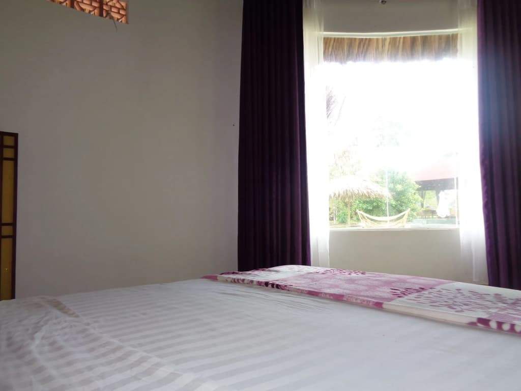 Ninila Fruit Farm Bungalow - photo 2