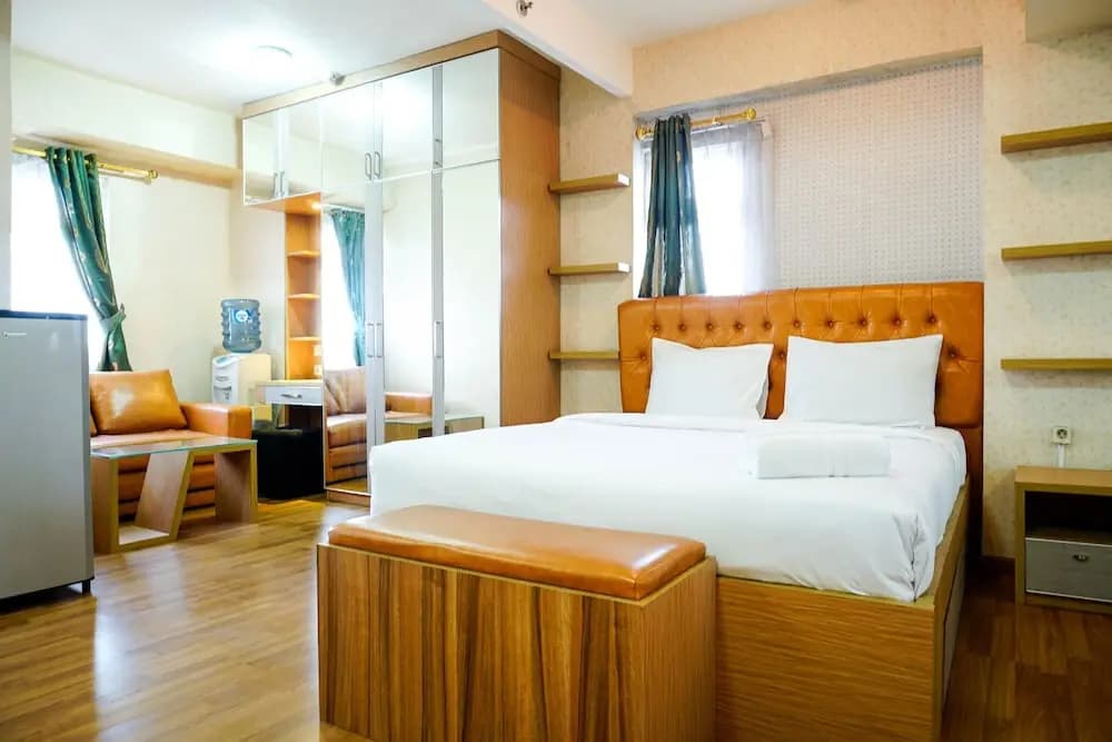 Furnished Studio with Comfortable Design Green Pramuka Apartment - photo 1