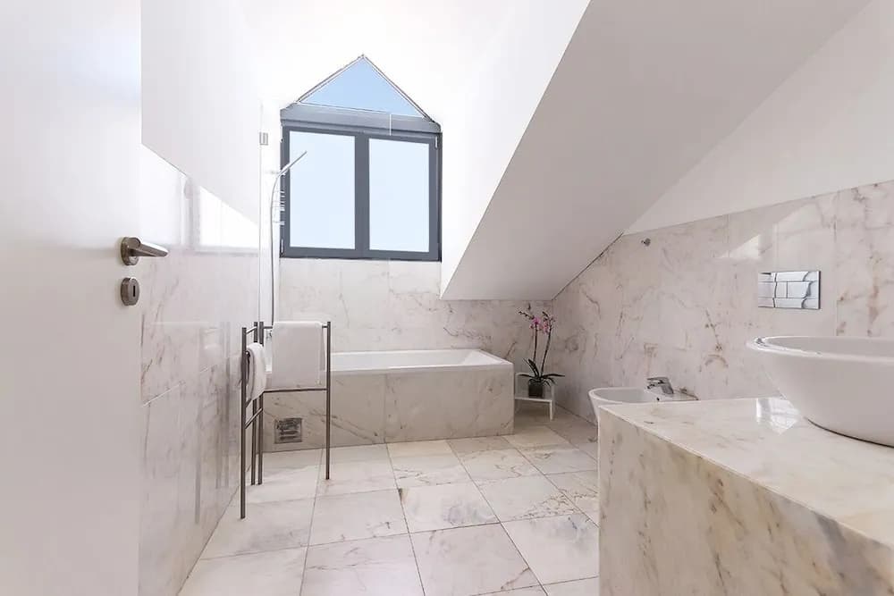 JOIVY Bold & classy 2BR home w/balcony in Baixa, moments from shopping streets - photo 9