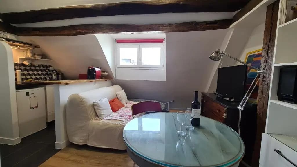 Appartement Cœur de Paris avec vue sur les toits - photo 9