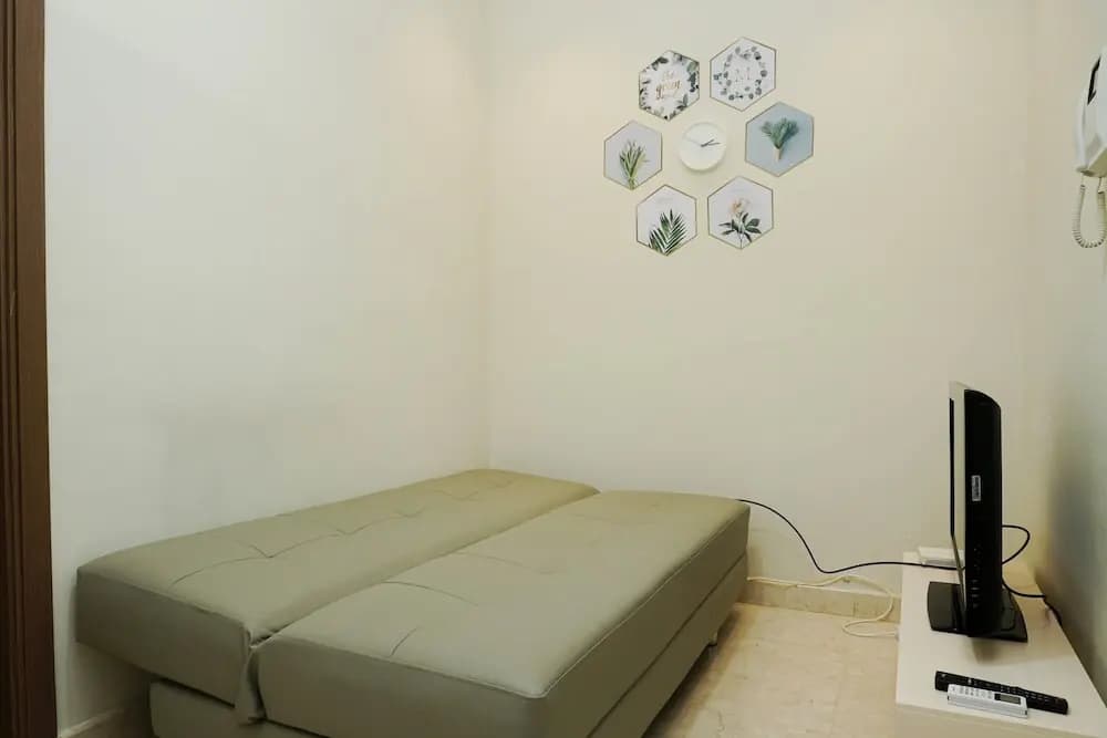 Minimalist and Relaxing 1BR Apartment at Puri Orchard - photo 17