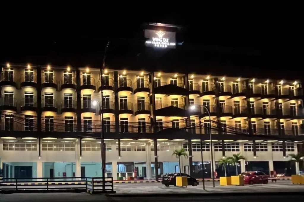 Wing Tat Grand Hotel - photo 12