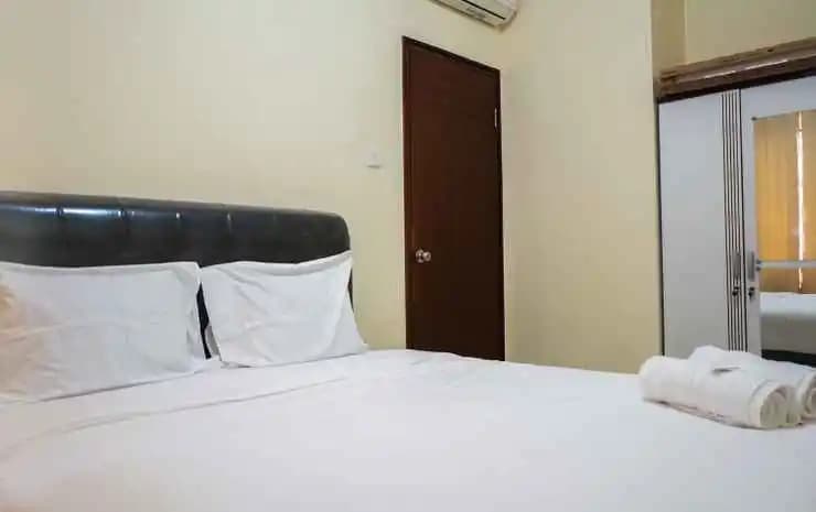 Sweet 2BR Mediterania Marina Residences By Travelio - main photo