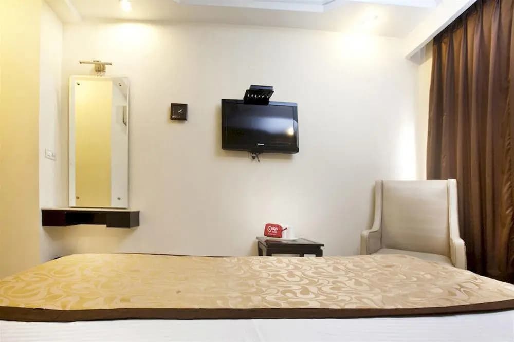 Capital O 312 Hotel Aster Inn - photo 7