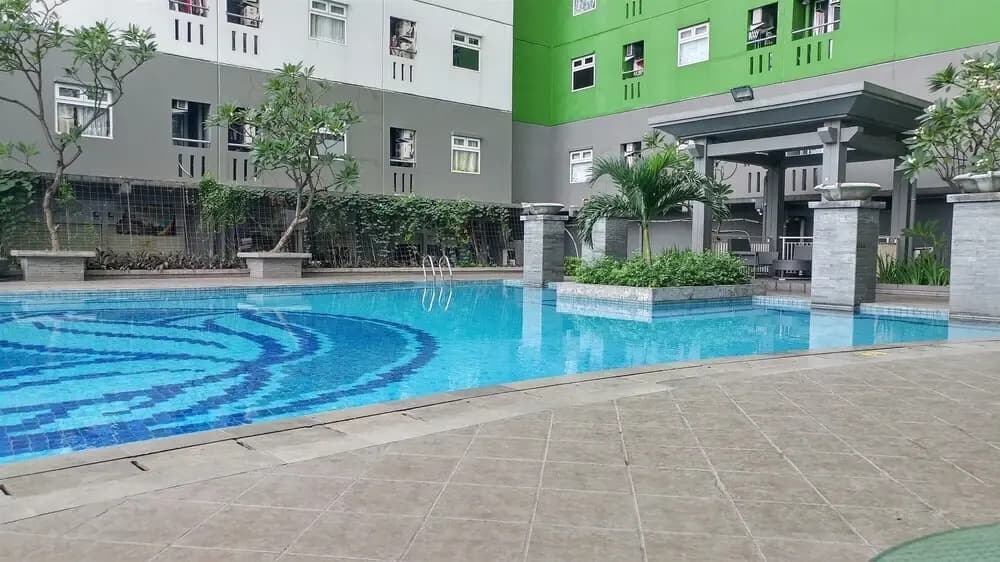 Comfort And Homey 2Br At Green Pramuka City Apartment - photo 9