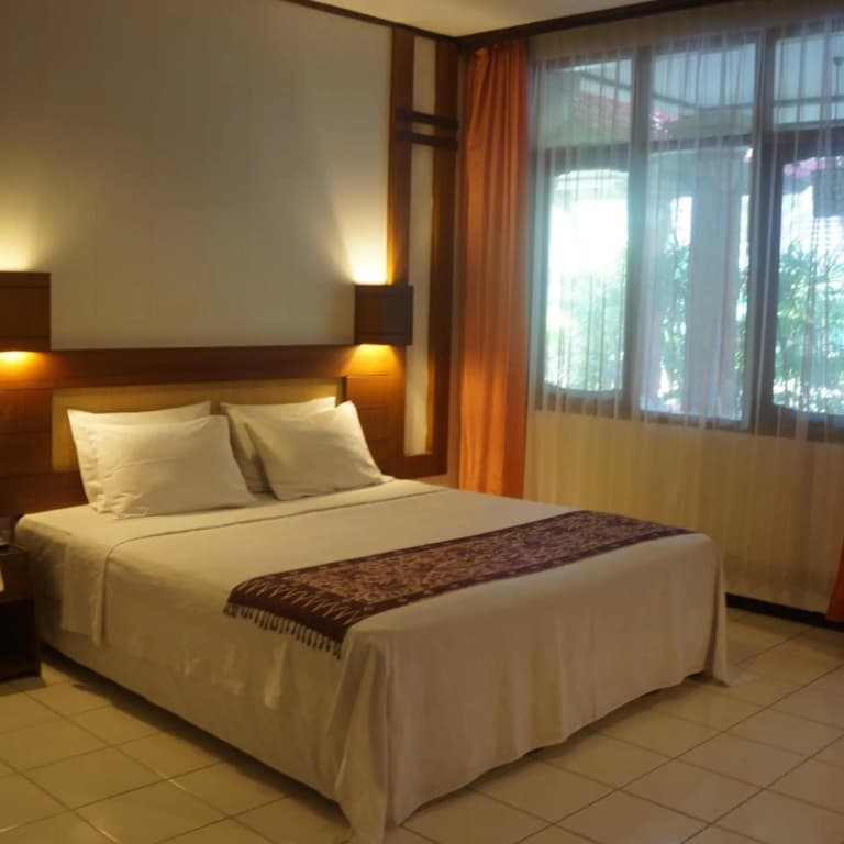 Puri Naga Beachfront Cottages - photo 36