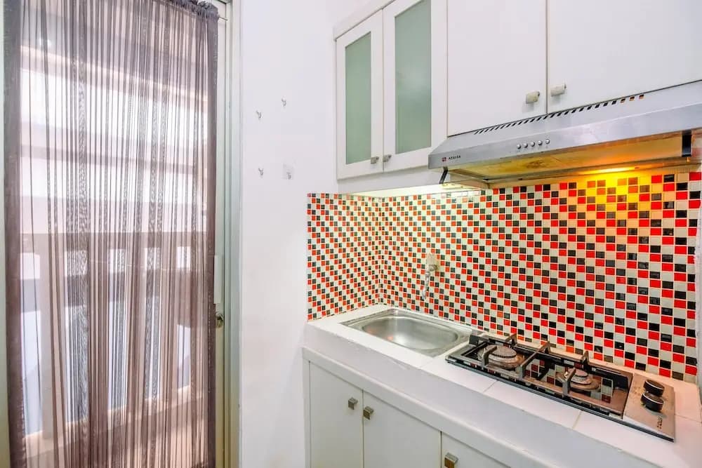 Homey And Fully Furnished Studio At Green Bay Pluit Apartment - main photo
