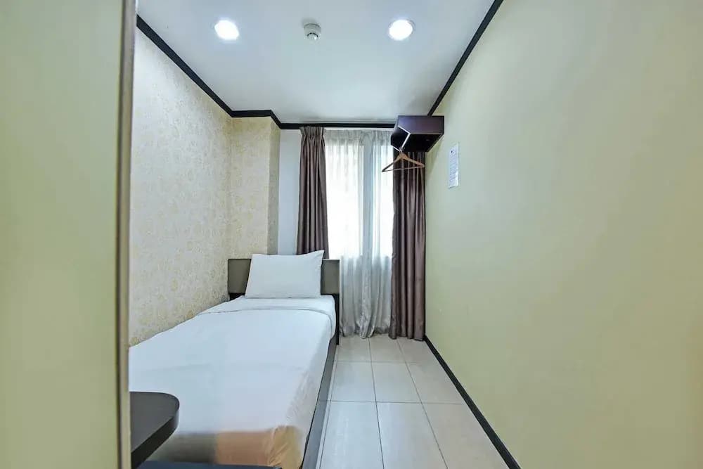 OYO 91009 One Enigma Hotel - photo 4
